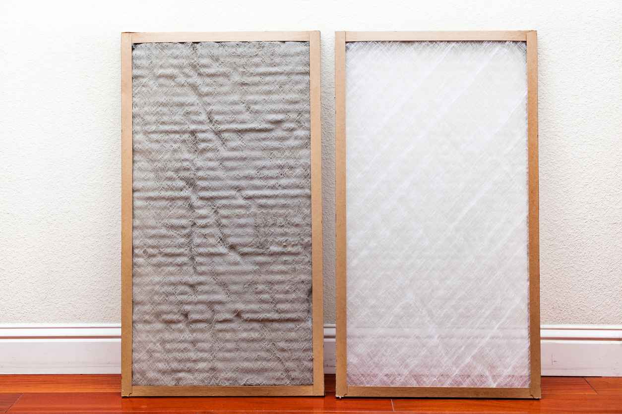 A side-by-side photo of a dirty vs. clean air filter