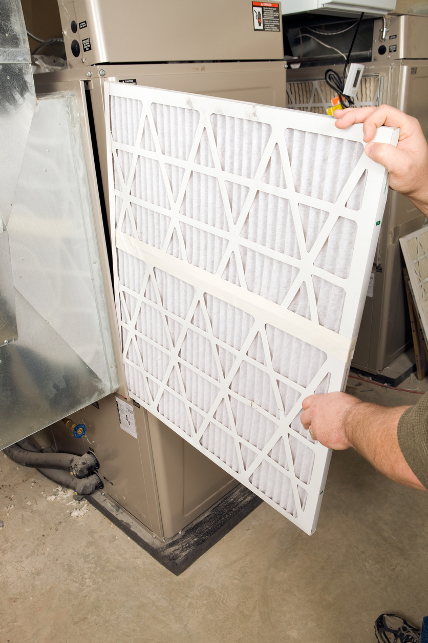 Changing out a furnace filter