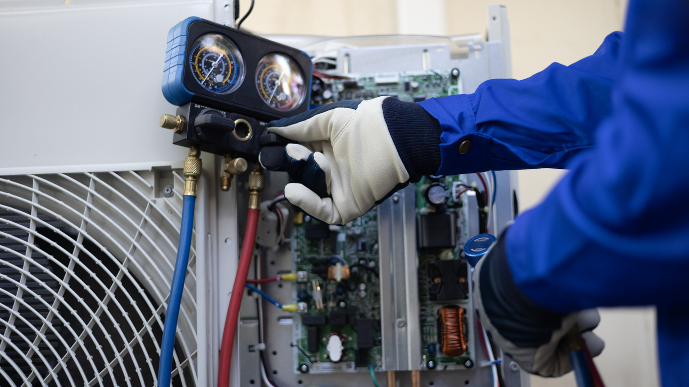 Technician Checking AC Refrigerant