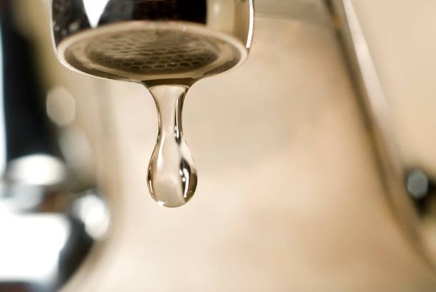 Dripping faucet in bathroom